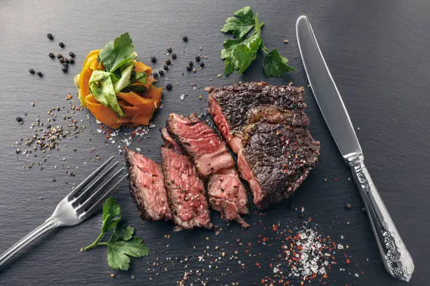 Photo of Sliced beef steak sous-vide with vegetable noodles