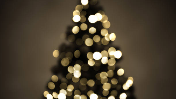 istock blurred christmas tree lights sepia 1047316460