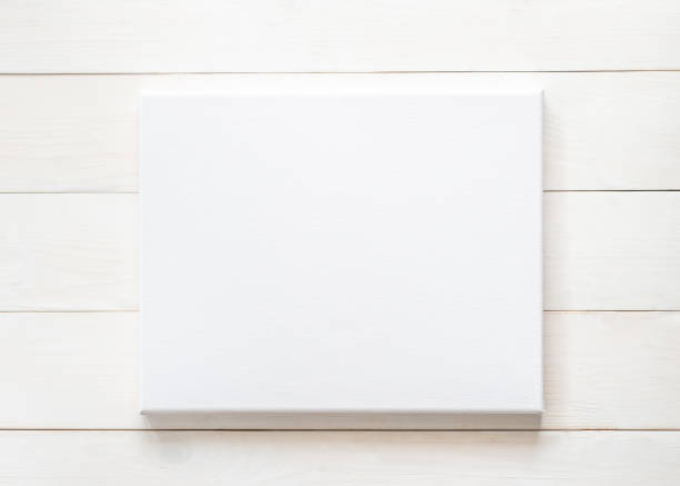istock Blank canvas frame mockup rectangular size on white wood wall for arts painting and photo hanging interior decoration 1047316724
