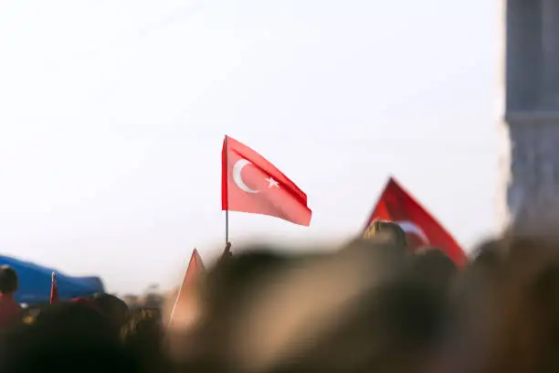 September 9 Independence day of Izmir. Crowded people in the square of Gundogdu and a Turkish flag in crowded people.