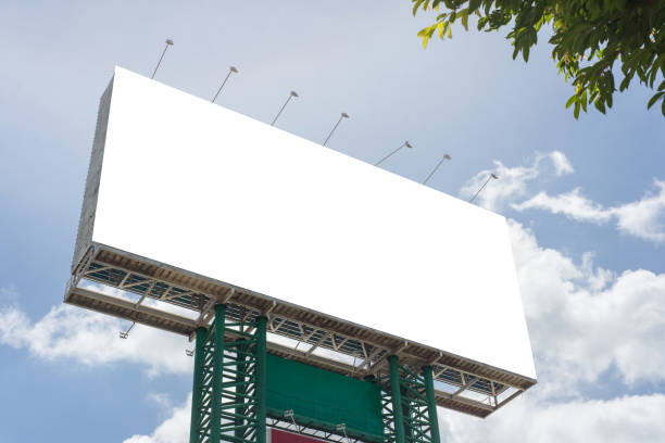 istock billboard blank on road in city for advertising background 1047316938