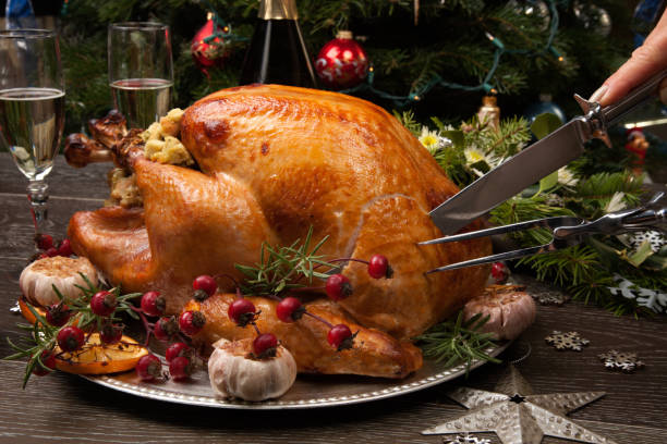 Carving Rustic Style Christmas Turkey stock photo