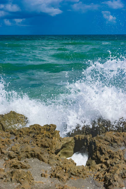istock Splashing Waves at Blowing Rocks 1047330550