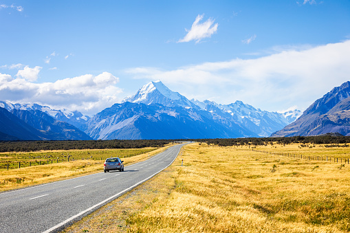 View of road trip car , road leading to mount cook national park, South Island New Zealand