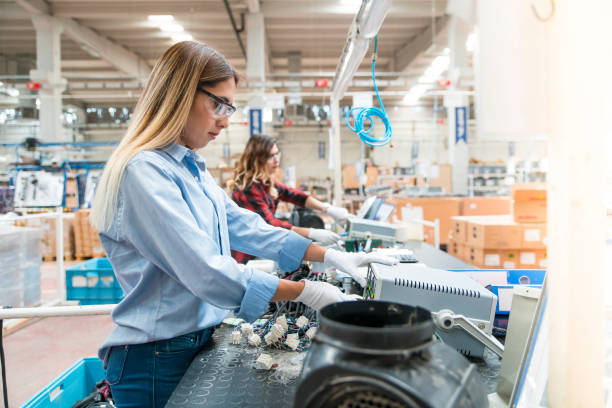istock women working in cable factory 1047332882