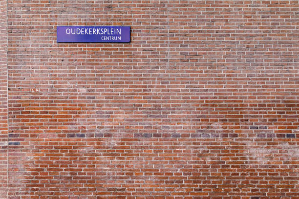 istock Brick Wall On Oudekerksplein Amsterdam 1047342142