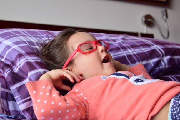 istock Lazy girl yawning 1047353338