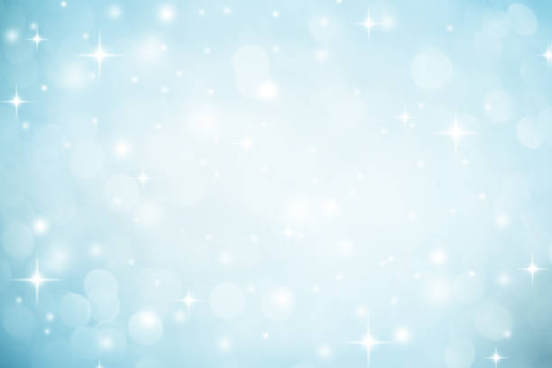 abstract blurred soft blue and white beautiful glowing blinking bokeh and snowfall and star on colorful background for merry christmas and happy new year design banner  and presentation concept - decorative ornament flash imagens e fotografias de stock