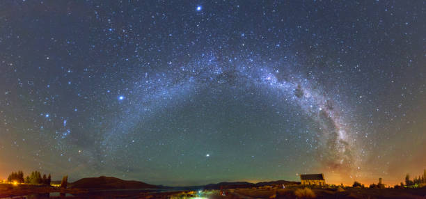 Panorama Milky way at the Church of the Good Shepherd, Lake Tekapo, New Zealand stock photo