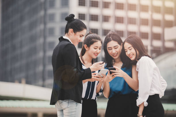 istock attractive asian businesswomen team 1047395498