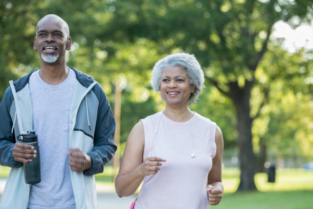 istock Senior African American couple jogs together 1047407444