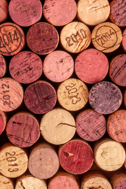 istock Wine corks background, overhead photo of red and white wine corks 1047425074