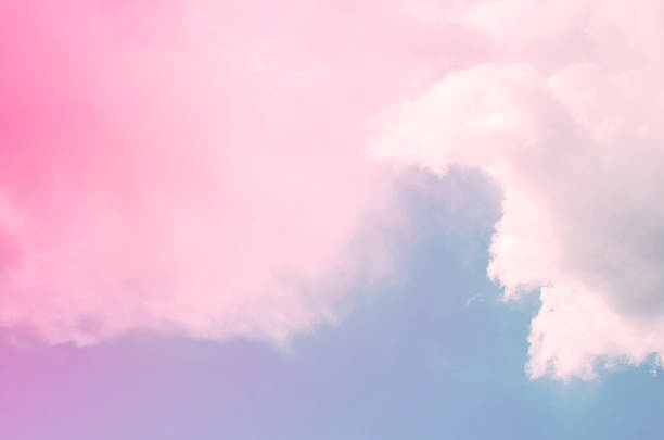 istock Nature background. Fluffy soft clouds in sky toned. 1047427684