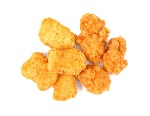 istock Fried chicken nuggets isolated on white background 1047430934