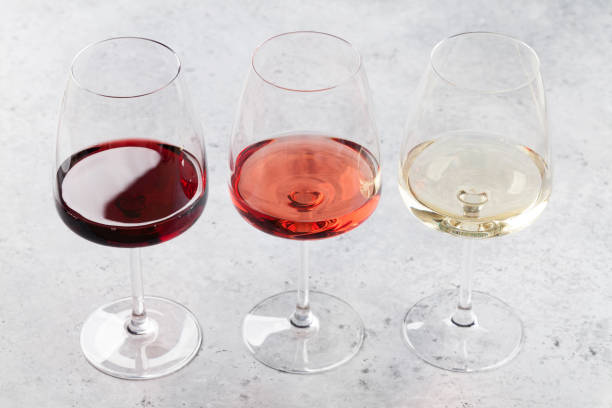 istock Red, rose and white wine glasses 1047433446