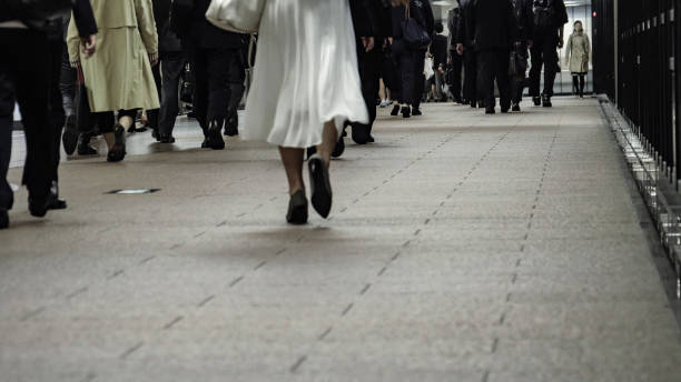 istock Crowd of commuters on their way to work in Tokyo 1047433782