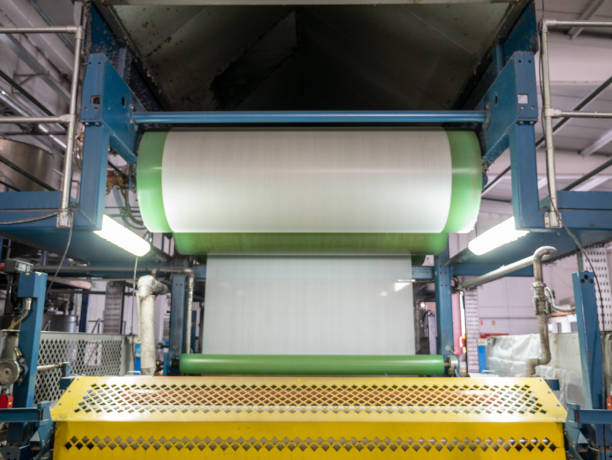 istock Industrial  warping and sizing machine  in textile factory 1047434384
