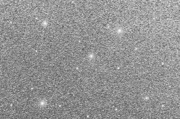 istock Silver glitter texture. Christmas or new year background for design. 1047437346