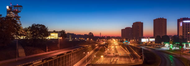 istock Panorama on Empty City Highway by Night 1047440420