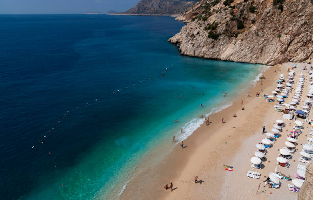istock Beach View with Turquoise Sea 1047448610
