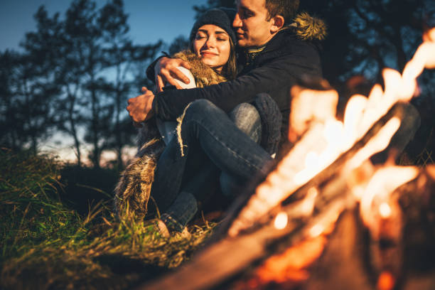 istock Pretty young couple relaxing outdoor 1047449598