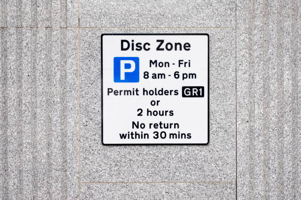istock Disabled Badge Holders Disc Zone Only at Car Park Sign 1047452320