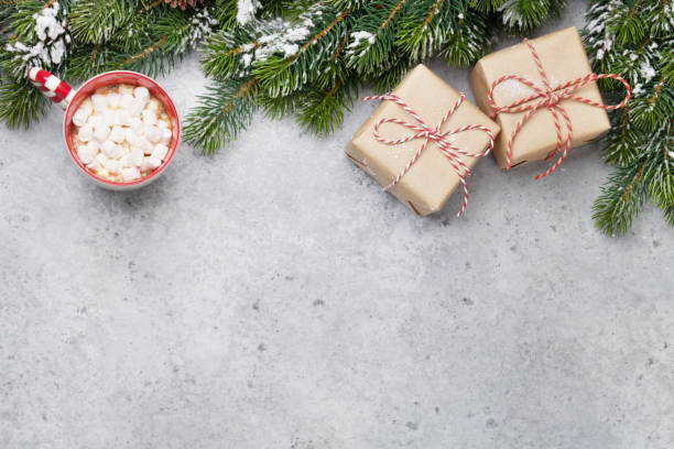 istock Christmas gift boxes and xmax fir tree 1047456780