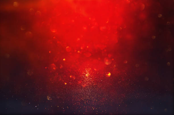 istock Red, black and gold glitter lights background. defocused. 1047460140
