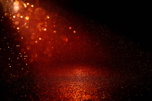istock Red, black and gold glitter lights background. defocused. 1047460364