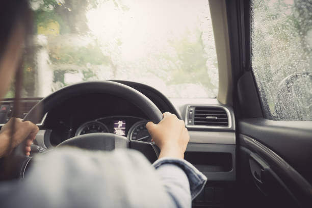 istock driving in rainy season 1047460596