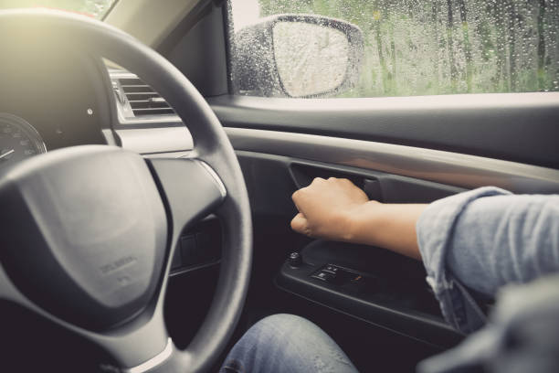 istock hand open car door 1047460660