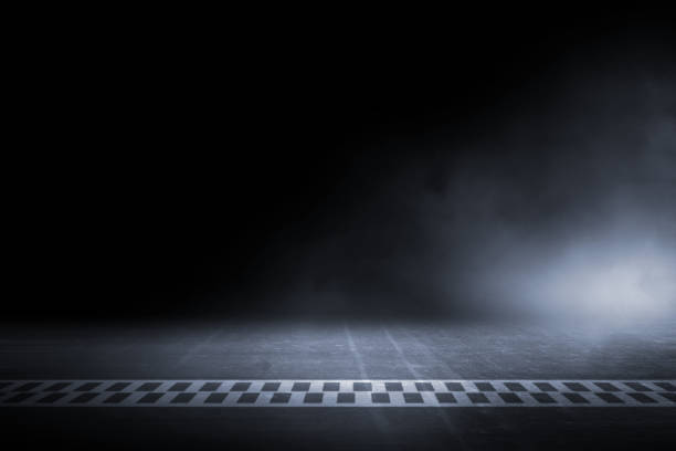 istock Race track finish line racing on night 1047461138