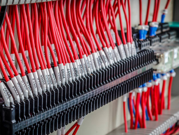 Wiring - Control panel with wires Wiring - Control panel with wiring in the control cabinet. installation art stock pictures, royalty-free photos & images