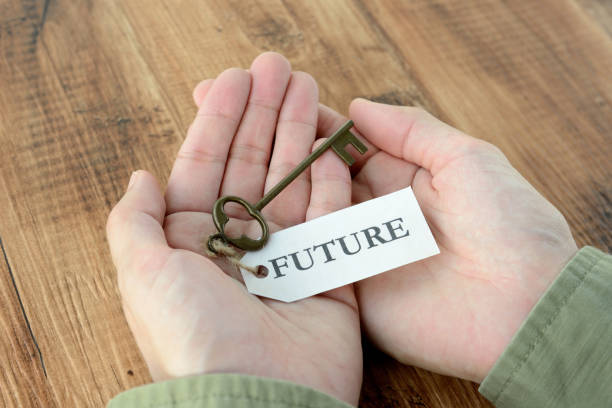istock Key to future surrounded by human's hands 1047471244