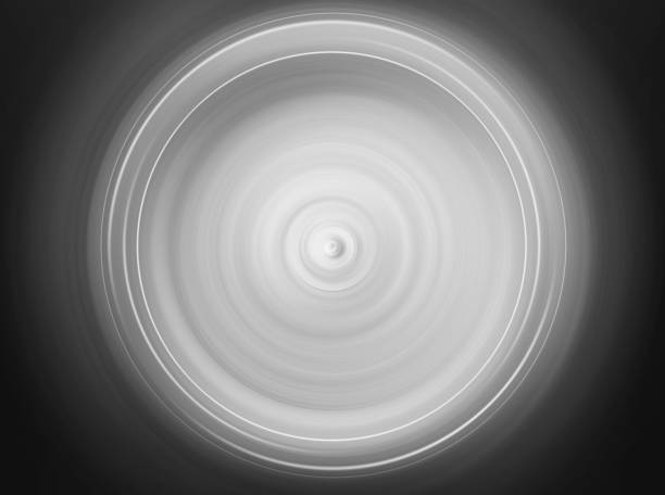 istock abstract dark spectrum black gray background 1047480112