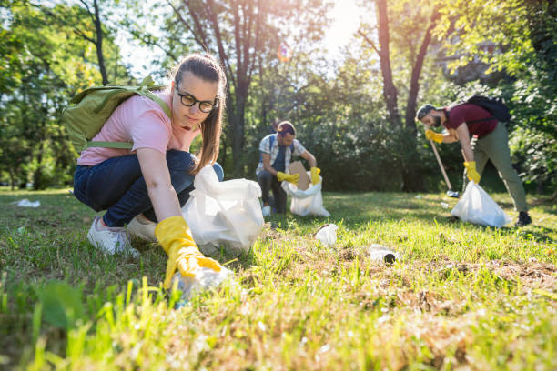 istock Young ecologists cleaning up together 1047482668
