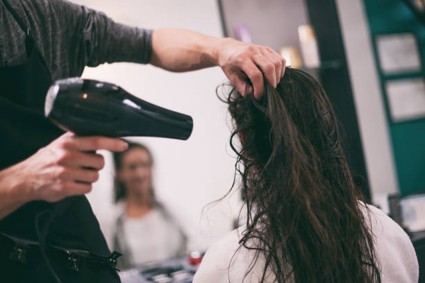istock Hair styling in professional saloon 1047484746