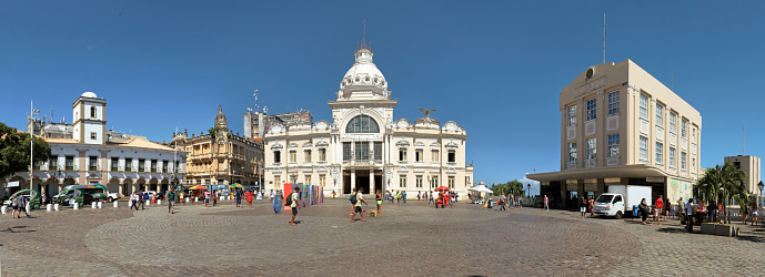 Salvador, Bahia, Brazil - July 24, 2018: city hall, Rio Branco palace and Lacerda elevator on municipal square on a cloudless day
