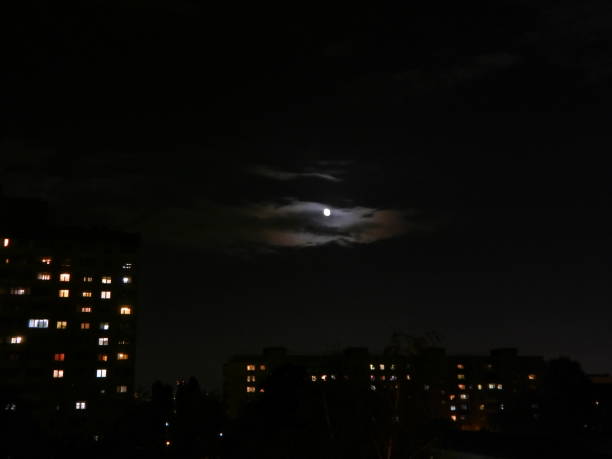 istock Full moon at night in the city shining bright 1047490270
