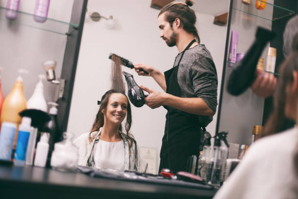istock Hair styling in professional saloon 1047490360
