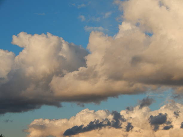 istock Clouds of a storm over the city float 1047490552