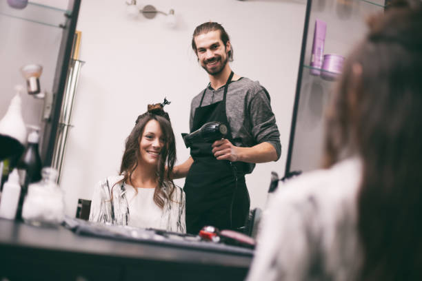 istock Hair styling in professional saloon 1047490754