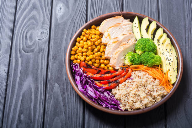 istock Buddha bowl with avocado , chicken , pepper , quinoa and chickpea 1047494088