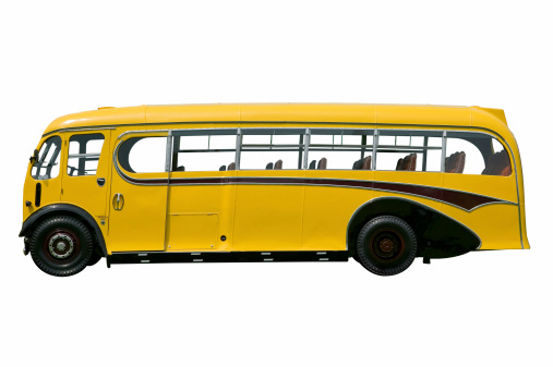 Vintage yellow school bus, isolated on white. With detailed clipping path.