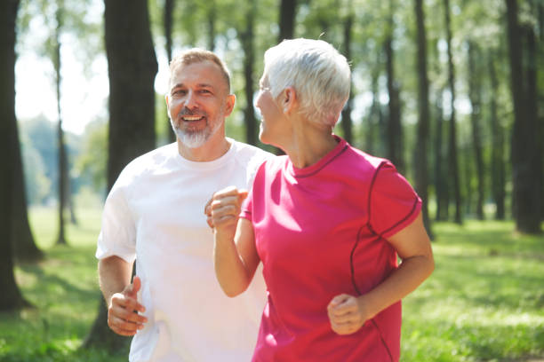 istock Senior couple exercising outdoors 1047502422