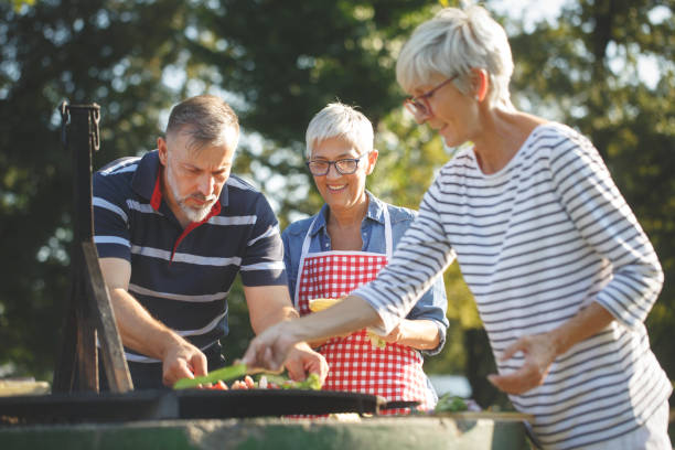 istock Senior people having a picnic 1047504198