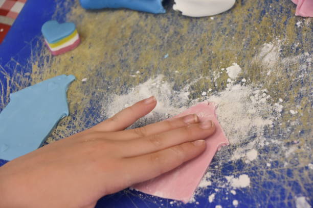 istock A girl makes a home made of dough 1047509332
