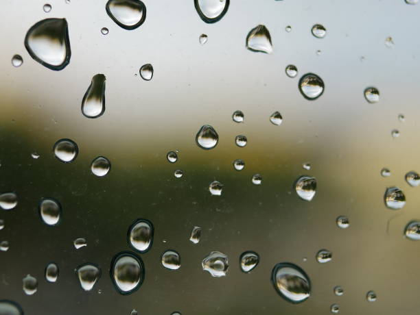 istock Natural water drops on glass 1047510194