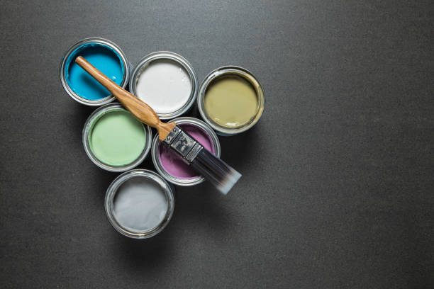 istock Cans of pastel coloured paint. 1047512736