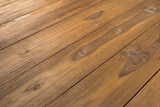 istock Old wooden plank background with selective focus. Wood Texture. 1047514122